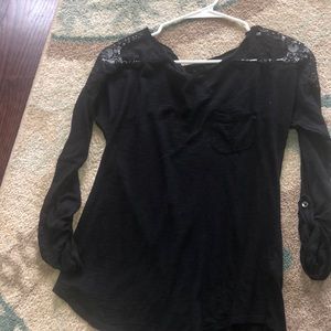 A black shirt with lace at top